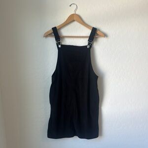 Black corduroy romper dress. Super cute lightweight adjustable straps.